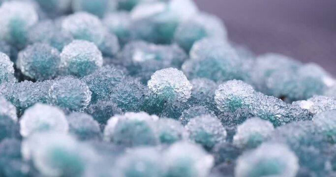 Quartz on green chalcedony footage. macro detail background. close-up Rough raw unpolished semi-precious gemstone