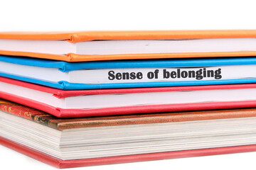 Business, sense of belonging concept. Text Sense of belonging on a notepad on a light background