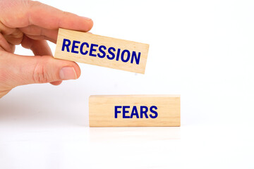 Recession fears symbol. Concept words RECESSION FEARS it is laid out by hand on wooden bars