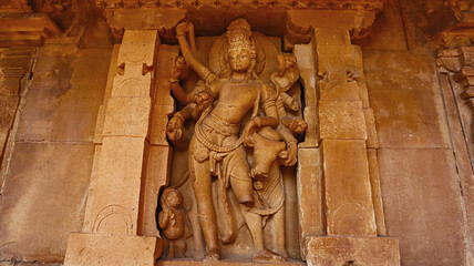 Carved Idol of Lord Shiva with Nandi on Shri Durga Temple, Aihole, Bagalkot, Karnataka, India.