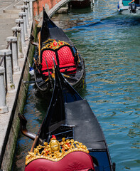 Obraz premium Gondolas, moored on channel in Venice