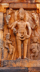 Carving Sculpture of Lord Vishnu on the Sri Malgatti Shiva Gudi, Badami, Bagalkot, Karnataka, India.