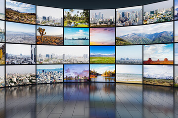 Abstract video wall in television production room as technology concept with colorful screens and...