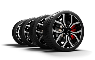 Row of black car wheels with alloy rims on transparent background