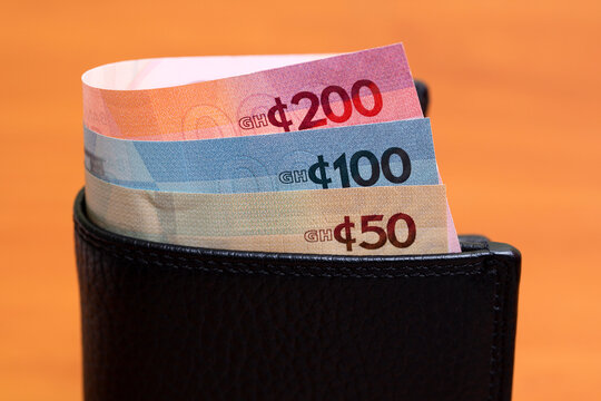 Ghanaian cedi in the black wallet