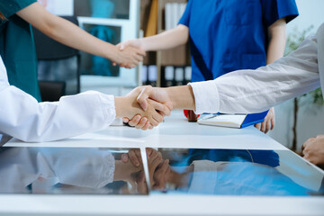 Doctor handshake and partnership in healthcare, medicine or trust for collaboration, unity
