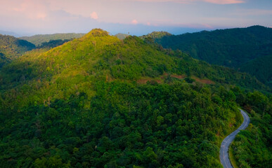 Panorama view with  wonderful springtime landscape in mountains. grassy field and rolling hills....