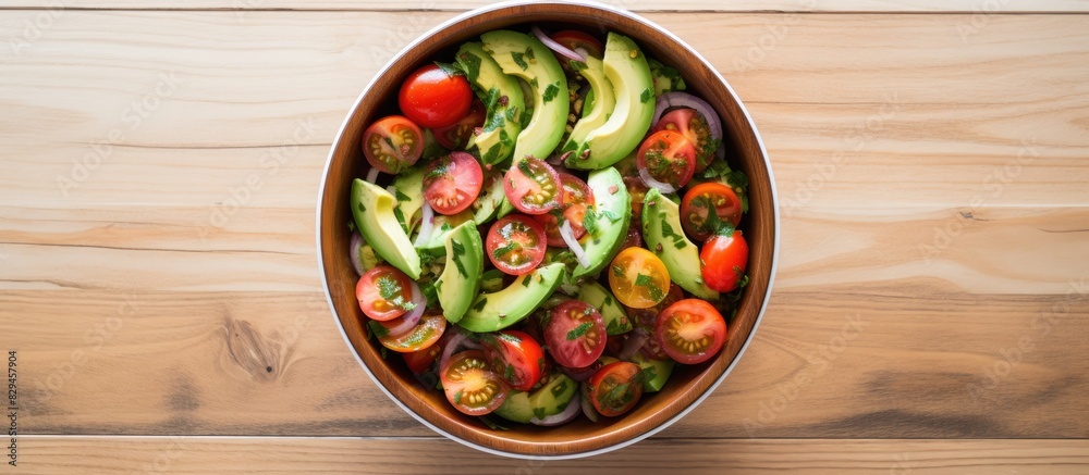 Aufkleber fresh avocado tomato salad in a bowl on a white wooden background top view flat lay overhead from ab