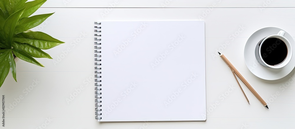 Aufkleber Top view of a white office desk table with essential work items like a laptop pen smartphone rope and notebook The image offers an ample copy space for customization