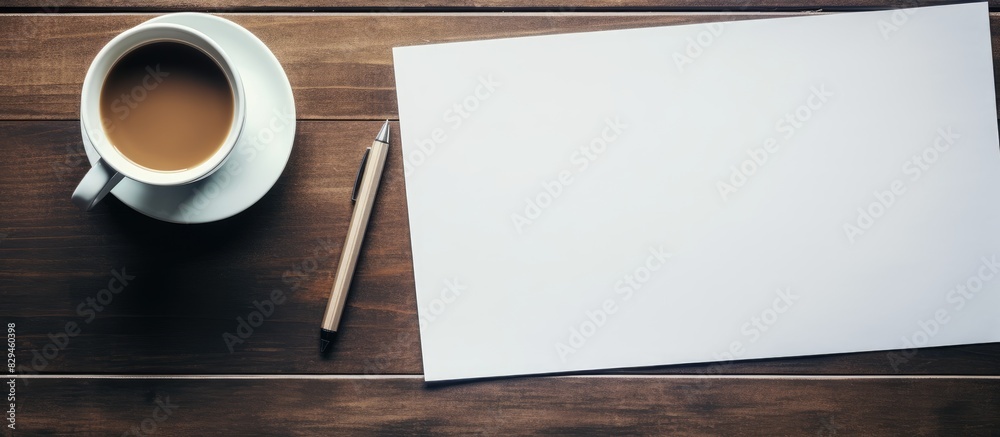 Aufkleber office workplace table with blank paper page coffee cup supplies and laptop flat lay top view with s