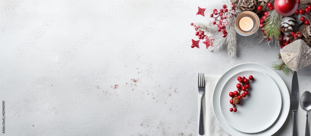 Poster Christmas table setting with festive decorations on light grey background with copy space Holidays background Top view flat lay
