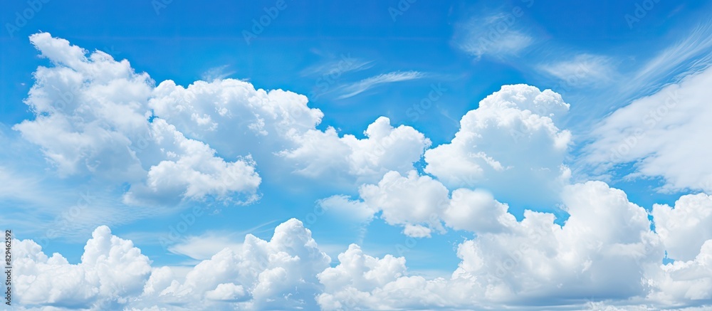 Aufkleber A stunning 21 9 view of a blue sky background featuring fluffy clouds with ample copy space image