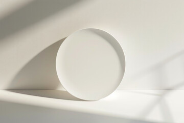 Fototapeta premium A simple, clean white background with a single, modern element like a perfectly round shadow 