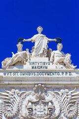 statue at Rua Augusta Arch in Lisbon, Portugal