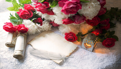 Paper with quill and flowers