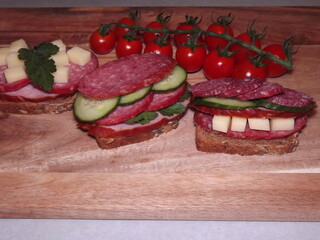 sandwich with different types of sausage and vegetables, quick snack