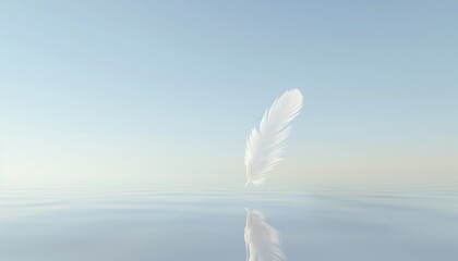 A serene white feather gently floating above a calm, reflective body of water under a clear blue sky.