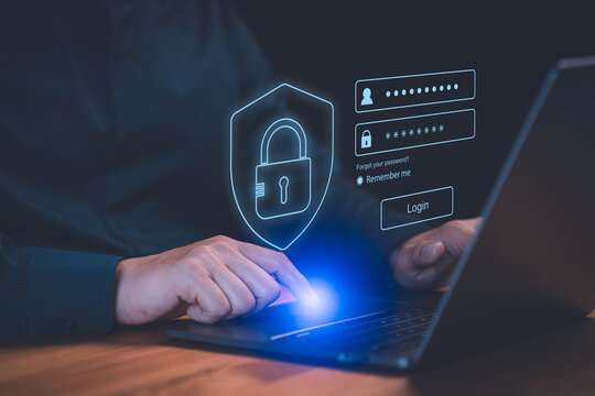 Cyber ​​security and digital data protection technology concept. Man use a laptop computer type the username and password. User privacy security and protect personal data internet network.