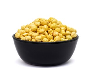 Roasted Chickpea or Garbanzo Bean in a Black Bowl Isolated on White Background with Copy Space, Also Known as Bengal Gram or Egyptian Pea