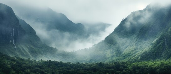 Mountain scenery covered with mist and rain providing a serene backdrop for a photograph with ideal...