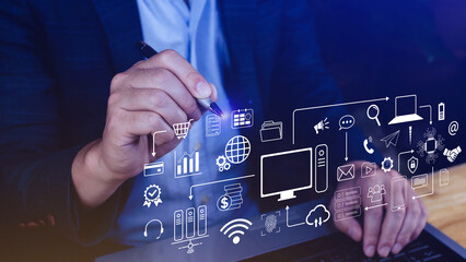 Businessman using technology equipment and line interface icons, Computer system resources and data...