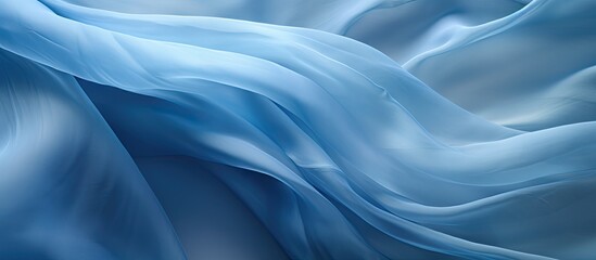 Obraz premium Use this delicate blue silk organza with an open weave as a luxurious material for your special occasions or projects perfect for a textured background with copy space image