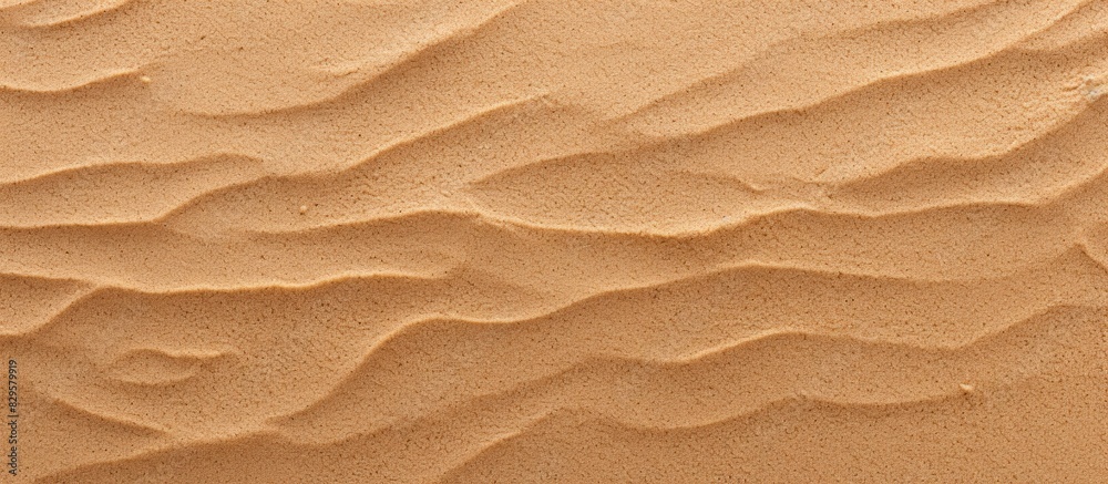 Canvas Prints Closeup of a summer beach sand surface with a fine brown sand pattern background for a copy space image