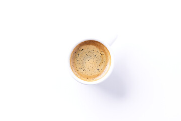 Cup of coffee isolated on white background. Top view. Copy space.
