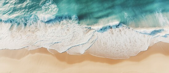 Aerial perspective of a secluded beach blanketed with copy space image