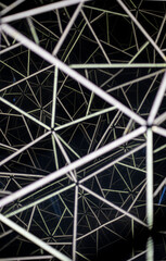 Abstract kaleidoscope background. Beautiful one-color kaleidoscope texture. Geometric kaleidoscope on black background
