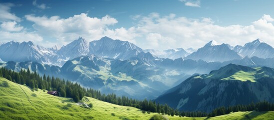 Fototapeta premium Stunning alpine scenery with a snow capped mountain and lush green valleys perfect for a copy space image