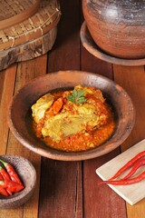 ayam rica rica kemangi,Spicy basil chicken is a Indonesian food, Indonesia traditional cuisine. Manadonese chicken dish