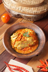 ayam rica rica kemangi,Spicy basil chicken is a Indonesian food, Indonesia traditional cuisine. Manadonese chicken dish