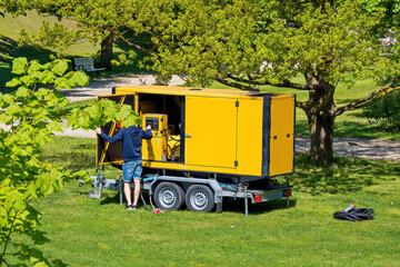 Mobile generator. Diesel generator for generating electricity on a trailer platform.