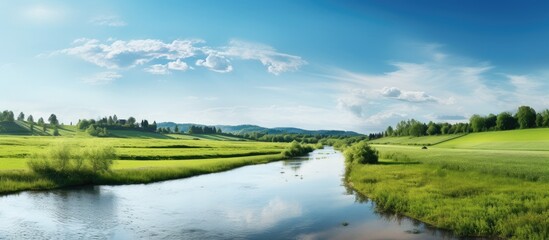 Sunny summer day featuring a river and a field with a serene landscape and copy space image