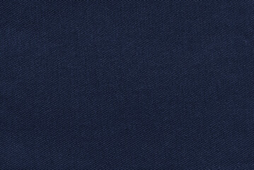 Dark blue cotton drill fabric pattern close up as background