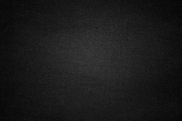 Black canvas texture, shaded black cotton drill fabric texture as background