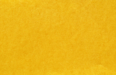 Obraz premium Yellow glossy paper texture as background