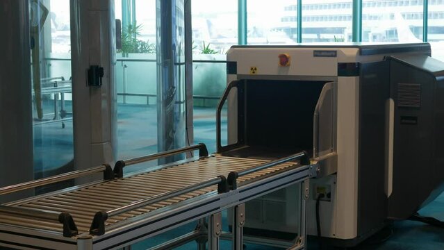 X-ray machines and body scanner for detecting prohibited items in luggage, bag at airport departure terminal hall security area