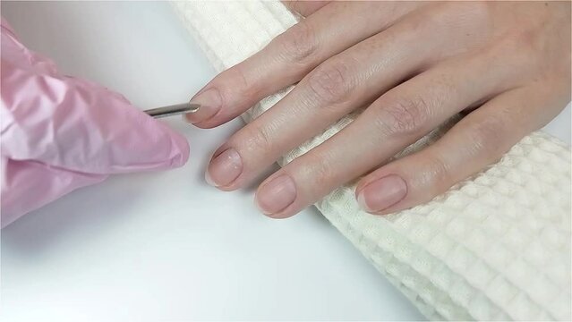 Gel polish manicure step-by-step video tutorial. Step 1 Nail cuticles push back and lift with the nail pusher