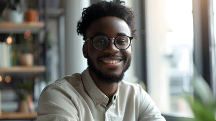 Obraz premium Cheerful Young Mentor Exuding Positive Energy and Expertise in the Workplace