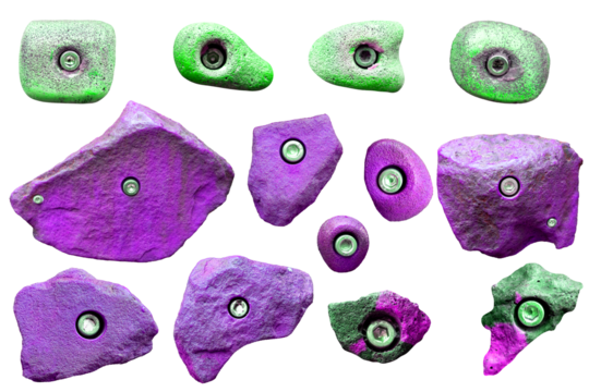 Set of grips different colors and shapes for climbing wall isolated on white background / set collection of various climbing holds with clipping path / bouldering extreme sport	
