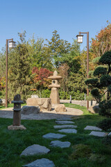 Traditional Japanese lamp Japanese Yamadoro-toro lantern made of stone. Close-up. Element of traditional Japanese architecture of Chinese origin. Japanese garden in Krasnodar park or Galitsky park