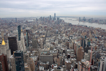 Aerial view of Manhattan in New York City showing the classic high rise buildings and city scape in...