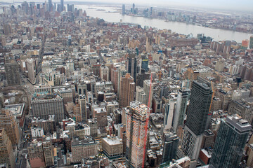 Obraz premium Aerial view of Manhattan in New York City showing the classic high rise buildings and city scape in the USA