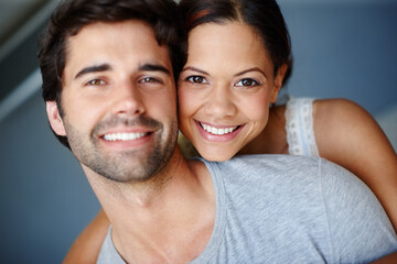 Hug, portrait and smile with couple in bedroom of home together for bonding, marriage or support....