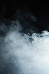 Close up shot of smoke on a black background, perfect for design projects