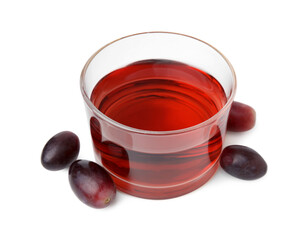 Wine vinegar and grapes isolated on white