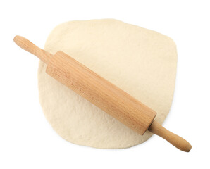 Raw dough and rolling pin isolated on white, top view