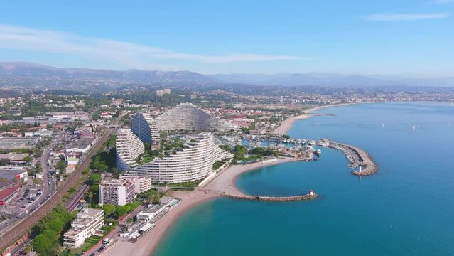 Nice, France: Aerial view of Marina Baie des Anges with yachts and boats in famous resort city by Mediterranean Sea on French Riviera - landscape panorama of Europe from above
